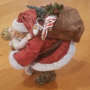 1996 Clothique Santa with child